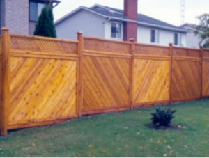 Backyard With Wooden Fence - idaho falls landscaping construction