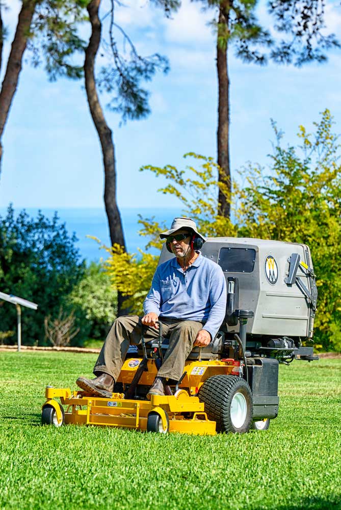 Man Mowing Lawn - idaho falls lawn care services